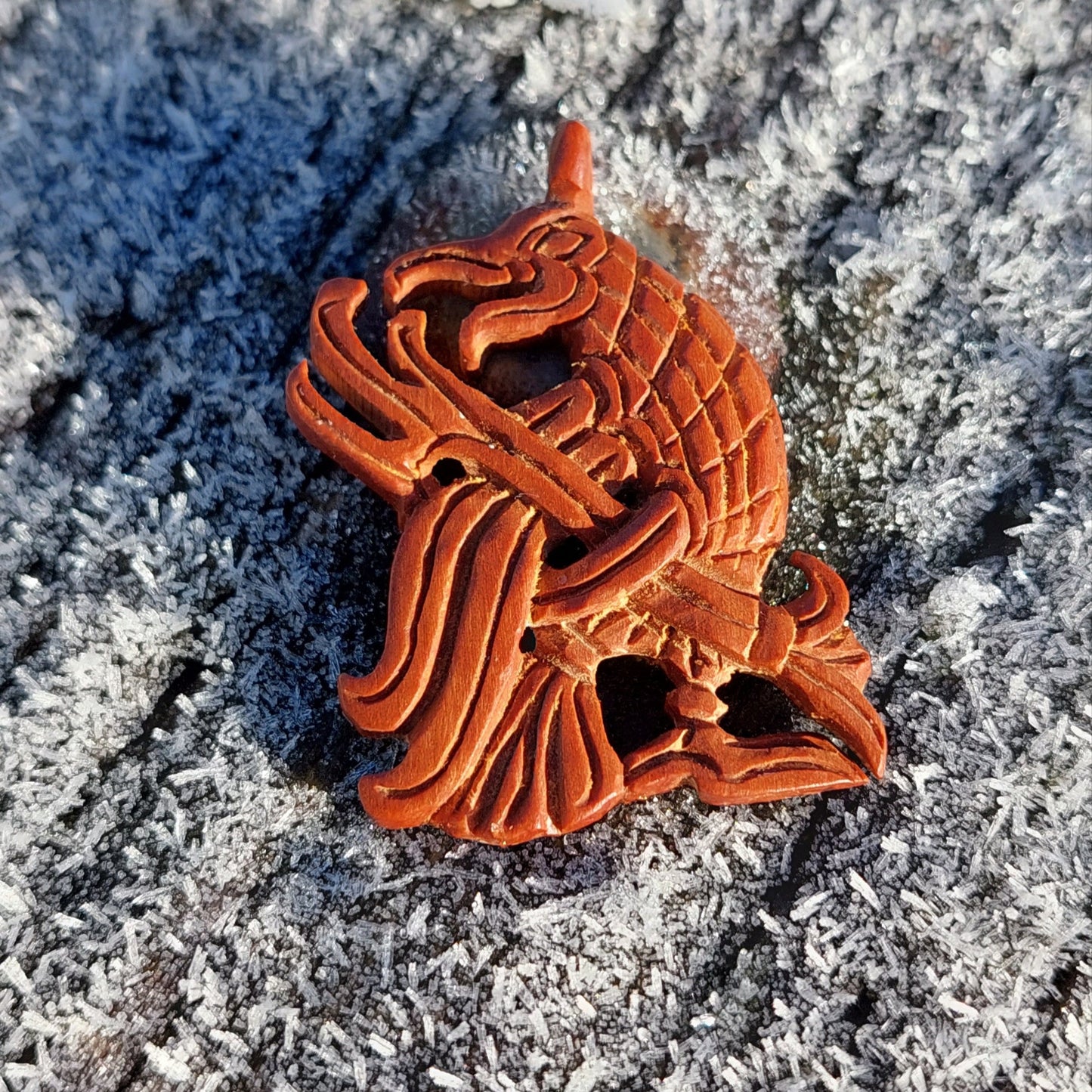 Greif aus Holz geschnitzt