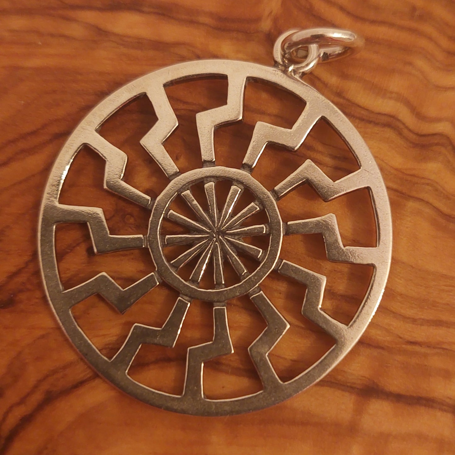 Sonnenrad aus 925er Silber oder Bronze