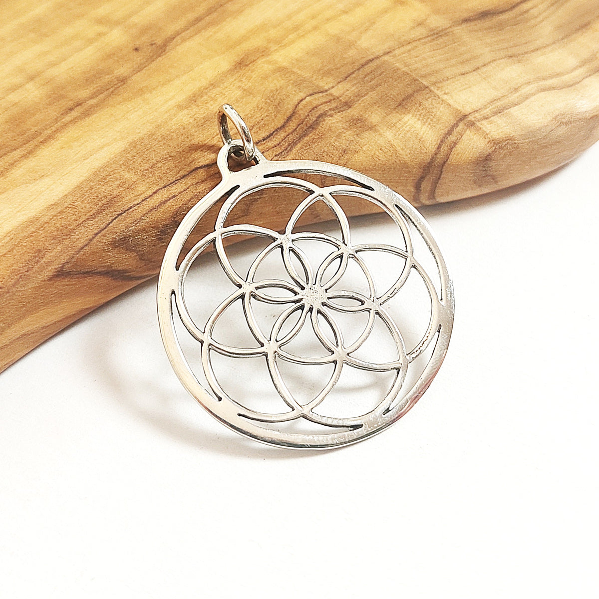 Filigrane Blume des Lebens aus Sterlingsilber oder Bronze
